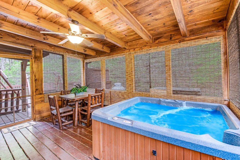 Enclosed hot tub retreat awaits. And, unwind in the hot tub or dine amidst nature in this lush hideaway!