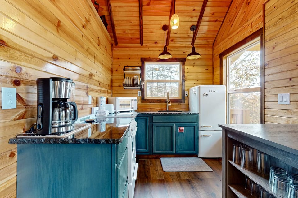 Whip up delicious meals in this stylish nook with bright views and modern appliances!