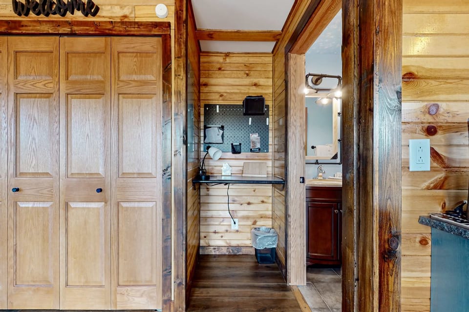 Step into this charming space with rustic wooden accents and a neat workspace!