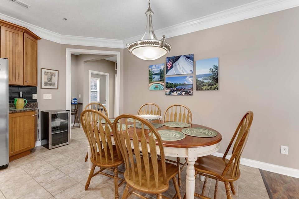 Gather around a charming table with delightful decor and scenic lake views!