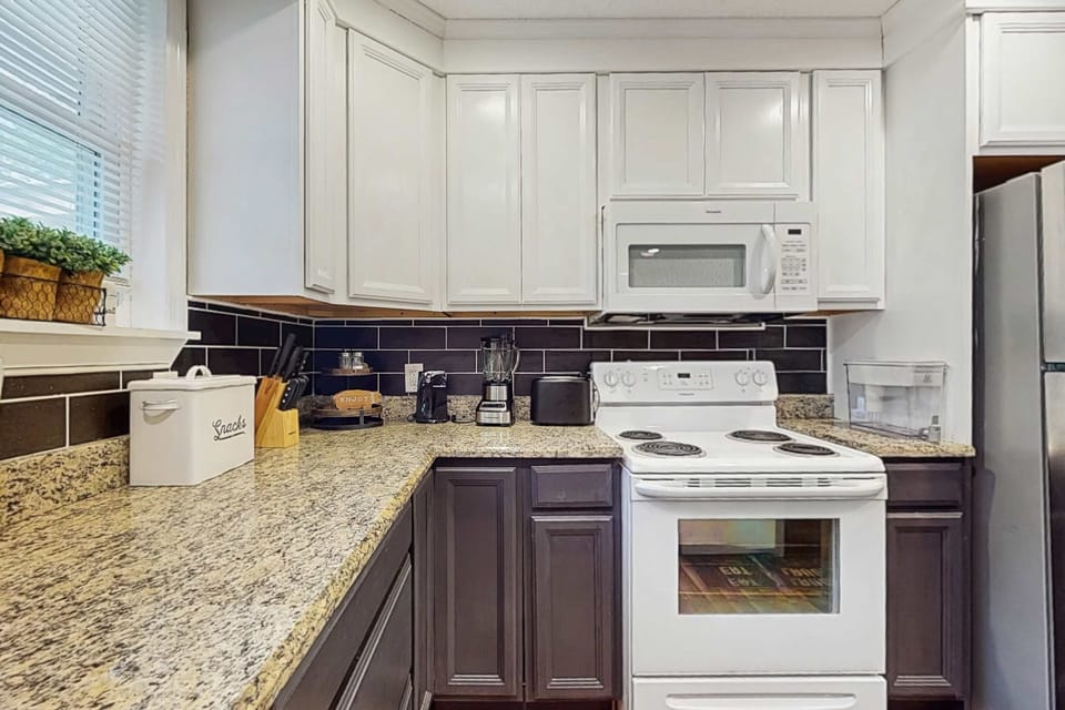 Kitchen delights awaits when staying at our place. With stylish granite countertops in your culinary paradise!