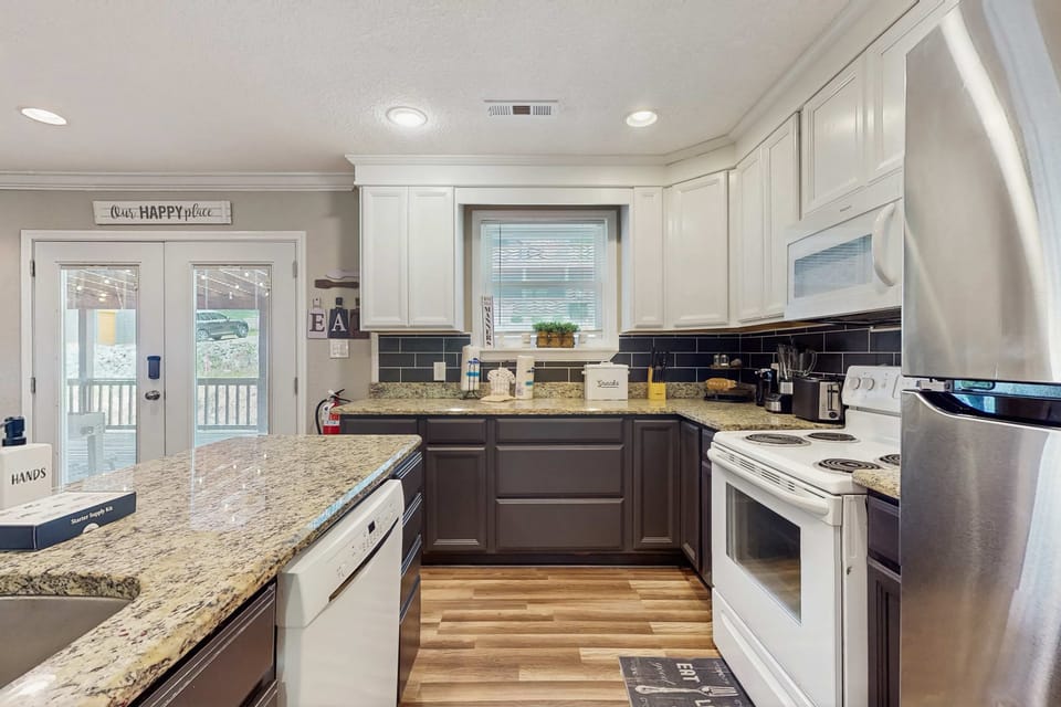 Modern appliances and granite countertops create a perfect cooking paradise!