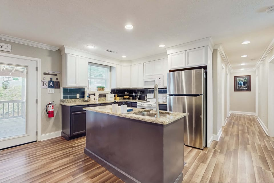 Sleek countertops and modern appliances for culinary delights in the heart of Gatlinburg!