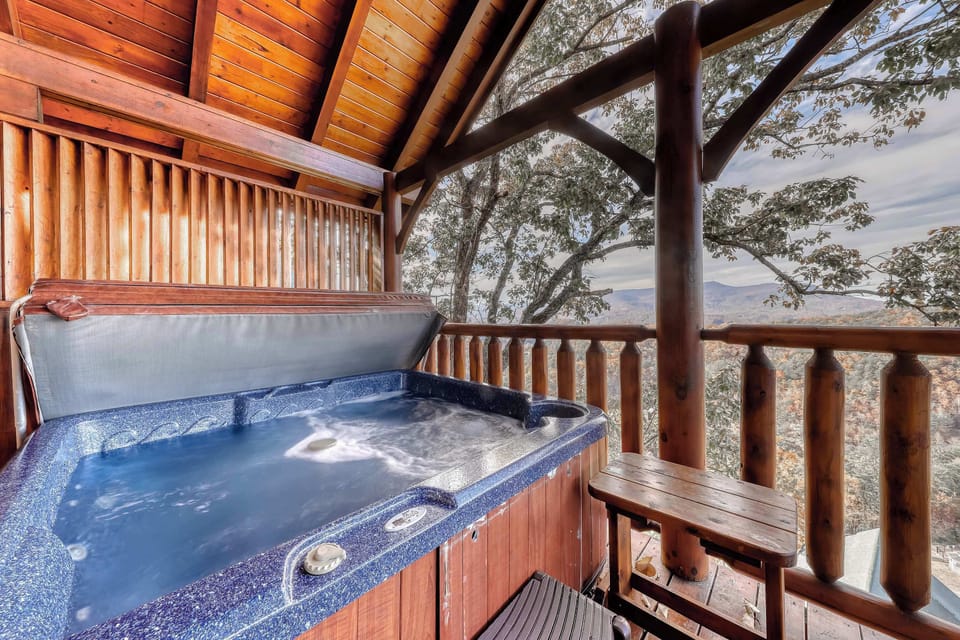 Jacuzzi retreat awaits. And, relax in the bubbling hot tub with spectacular mountain views!