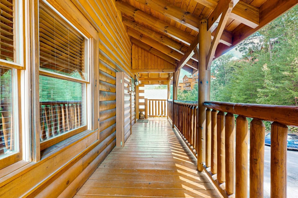 Outdoor Deck, enjoy stunning views while sipping coffee in your private log cabin retreat!