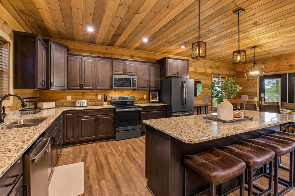Whip up delicious meals in style with granite counters and modern appliances!