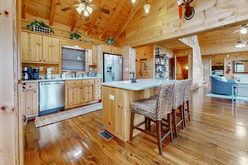 Sleek countertops meet rustic charm in this inviting space for culinary adventures!
