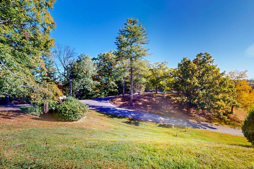 Quiet wooded surroundings with walking paths and scenic views. Enjoy nature, privacy, and convenience at this mountain-area condo getaway that sleeps 6.