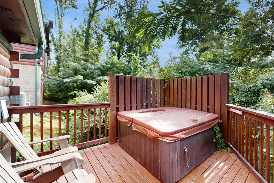 Private hot tub retreat awaits. And, unwind in nature with a bubbly soak and serene forest views!
