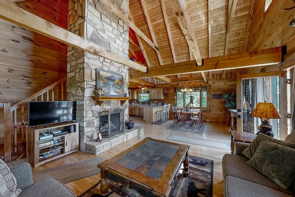 Rustic charm meets modern comfort with breathtaking views and inviting natural light!