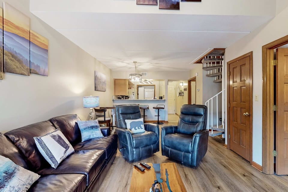 Stylish leather seating and warm artwork create the perfect gathering space!