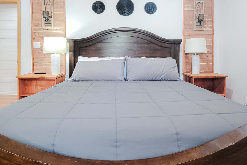 Relax in this spacious sanctuary with rustic charm and modern comforts!