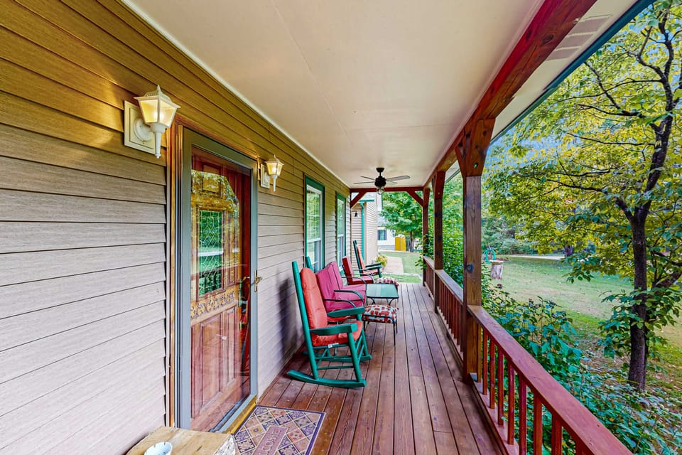 Enjoy serene mountain views from rocking chairs on this charming porch!