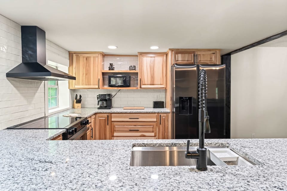 Modern appliances and stunning granite, perfect for culinary adventures!