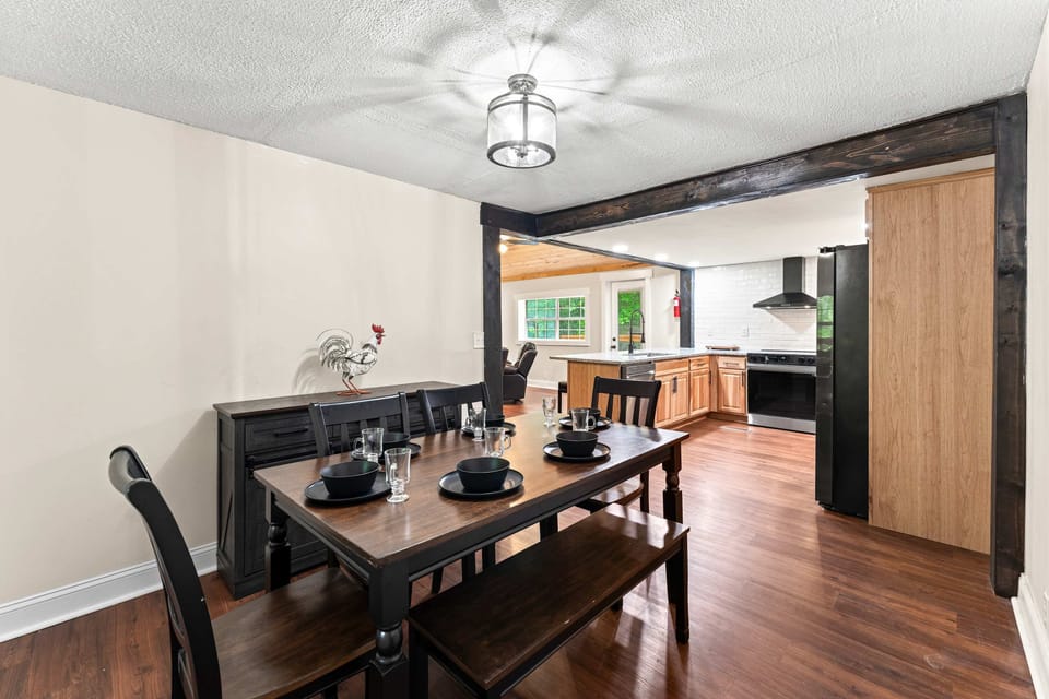 Gather around the stylish table and enjoy meals with nature peeking through the windows!