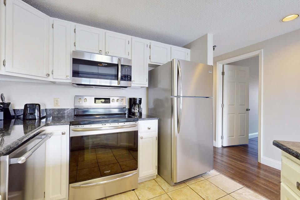 Bright space with modern appliances, perfect for culinary creations on your getaway!