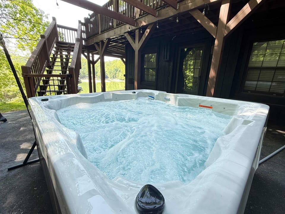 Hot Tub Oasis, unwind in a bubbling retreat surrounded by nature's beauty! Relax and rejuvenate!