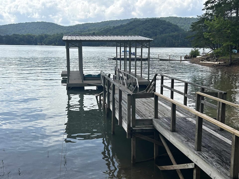Dockside relaxation awaits. Beautiful lakefront dock awaits your adventures! Perfect for fishing or boating!