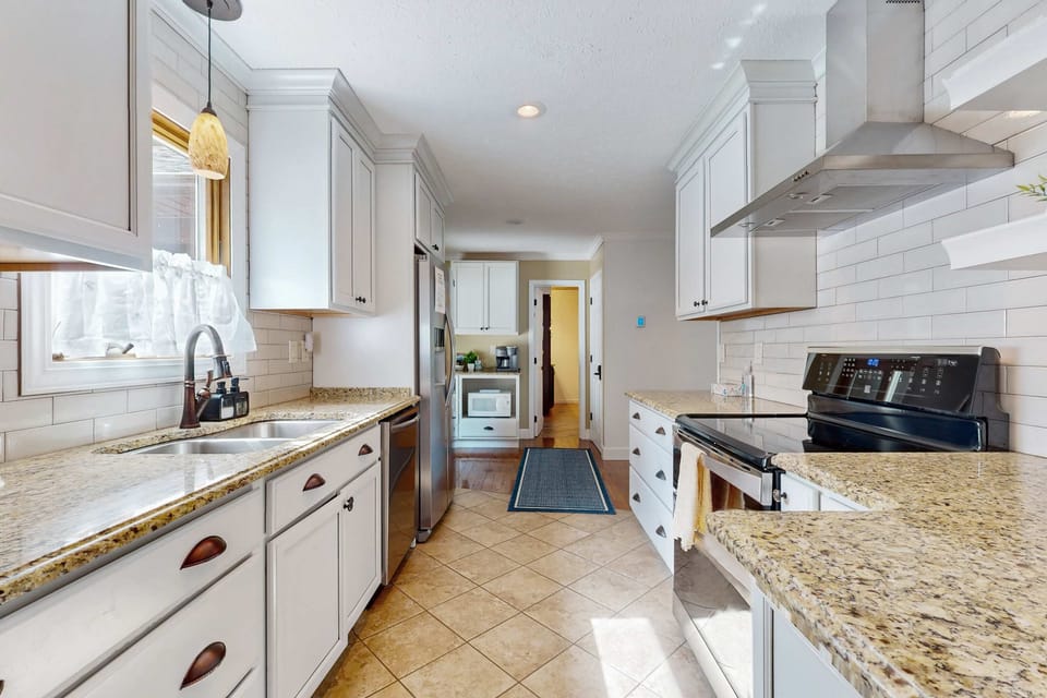 Modern appliances and stunning countertops for culinary adventures await!