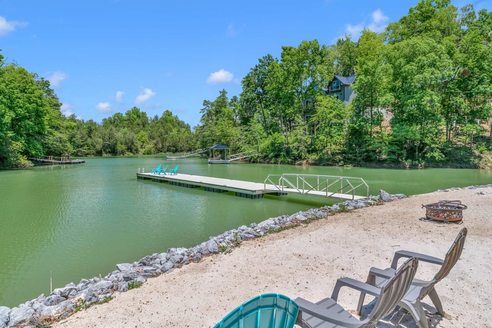 Step outside to direct lake access, a private dock, and shoreline seating. Ideal for fishing, kayaking, boating, and true lakefront getaway in Tennessee.