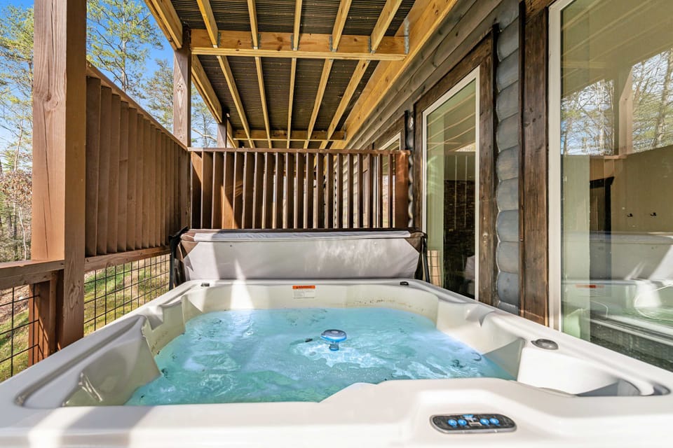 Hot Tub Retreat awaits. And, unwind in this private hot tub with breathtaking forest views!