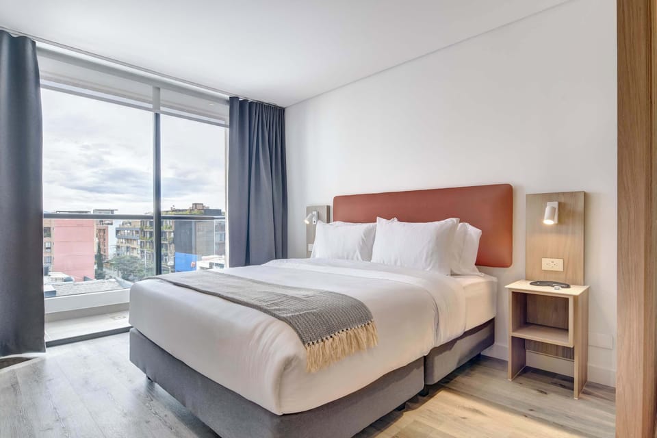 Bedroom with double bed and natural light