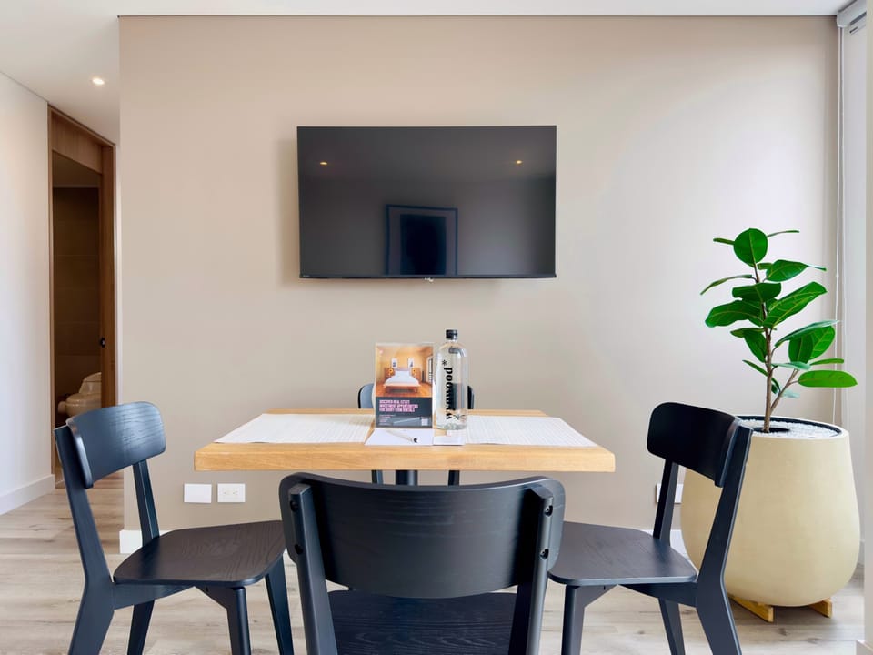 Dining room with tv.