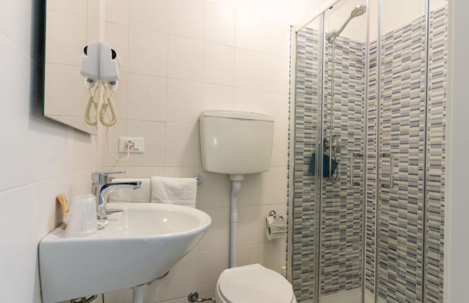 Standard Double or Twin Room, Balcony | Bathroom | Shower, hair dryer, towels, soap