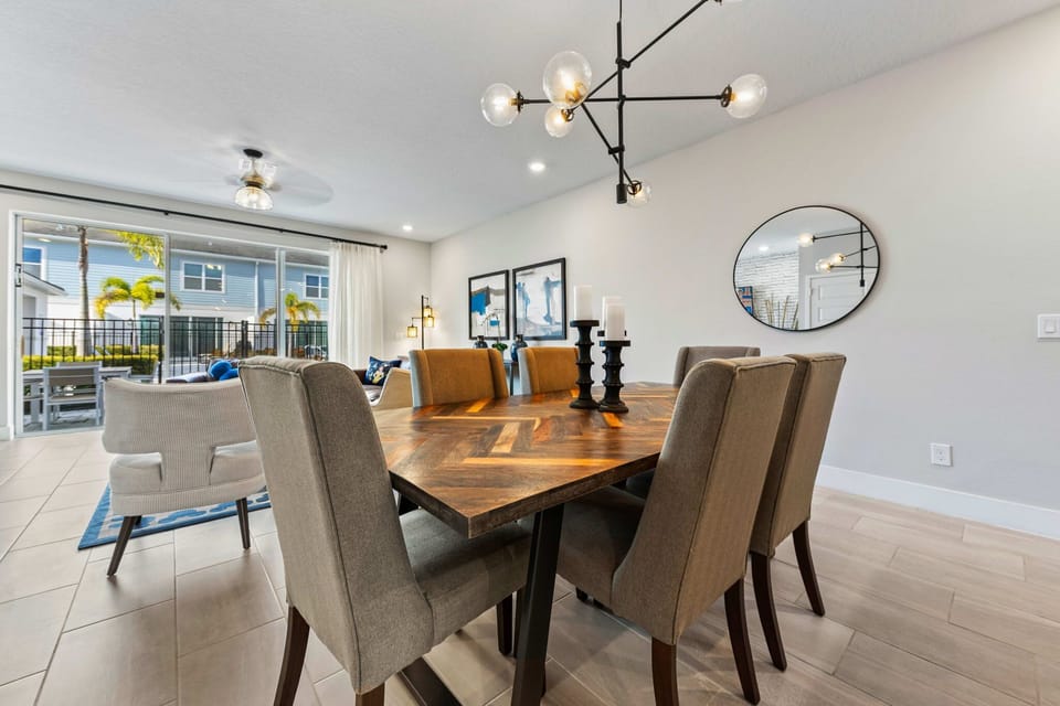 Bright, modern living with plenty of natural light! Relax on the leather sofa or step outside to the private patio for a breath of fresh air.
