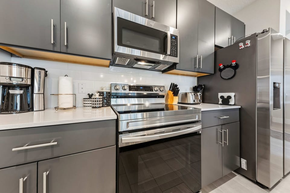Modern kitchen with ample cabinetry and a functional layout—perfect for cooking, gathering, and entertaining with ease.