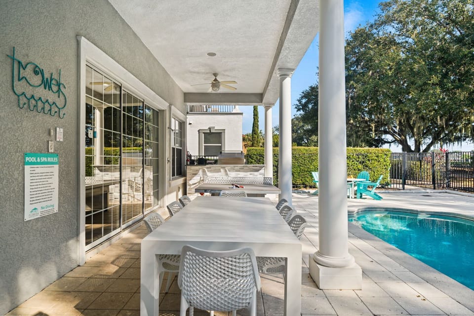 Stylish Patio Lounge and Dining Area by the Pool