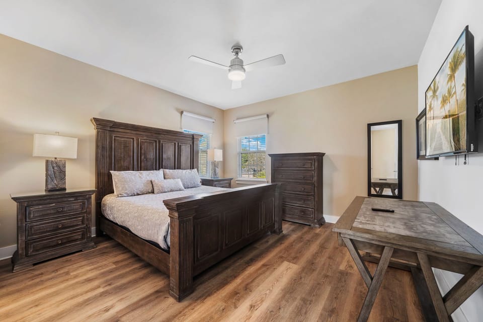 Spacious King Room Featuring Ornate Furniture and Smart TV