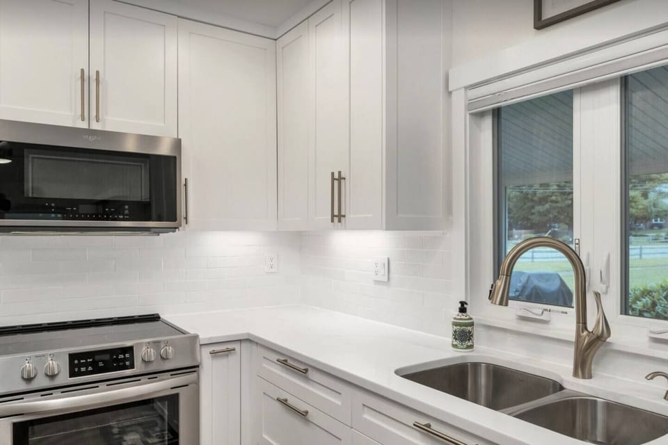 Cook, dine, and connect — fully equipped kitchen with seating for the whole group.