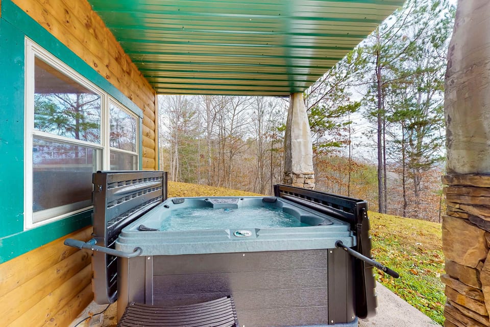 Unwind in your private hot tub with stunning forest views, relaxation awaits!