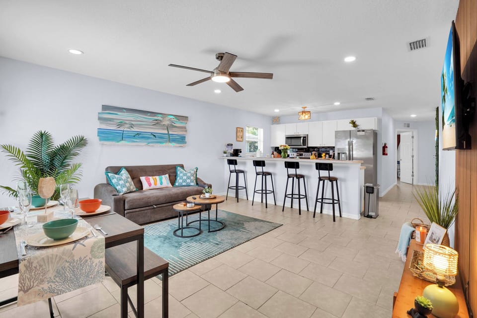 Spacious living room complete with local artwork custom made by Tim Steller. 