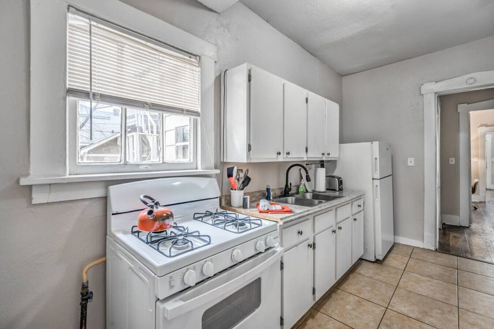 Bright natural light makes breakfast prep and casual cooking enjoyable and effortless.