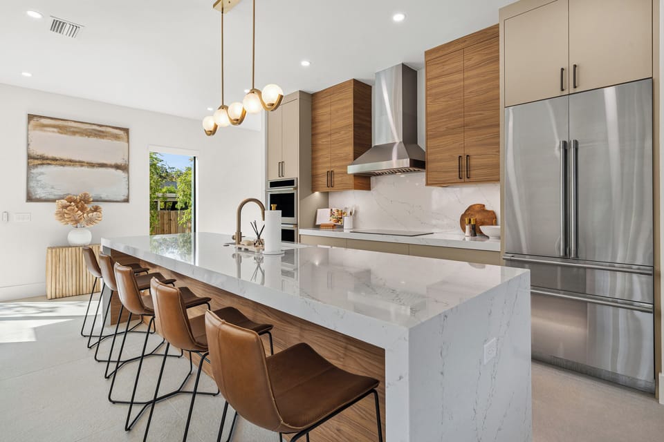 We love this spacious, open concept kitchen for everyone to feel connected!