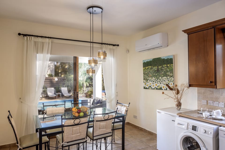 Dining area with access to pool terrrace
