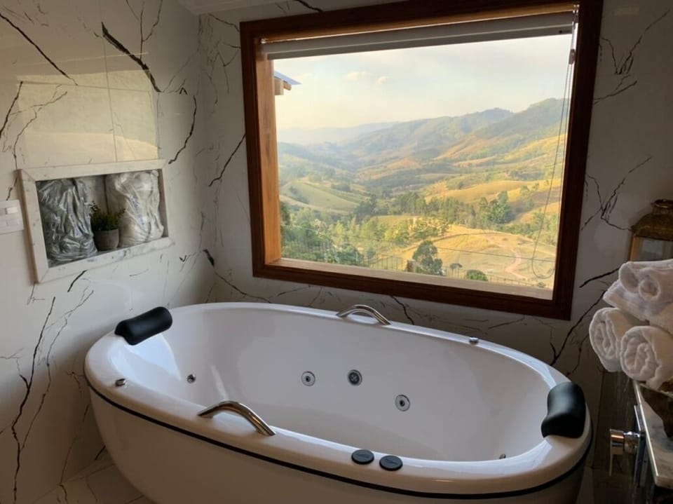 Luxury Room, Mountain View | Minibar, in-room safe, WiFi (free), individually furnished