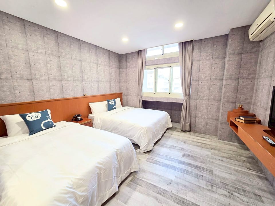 Triple Room, Multiple Beds | Down comforters, desk, laptop workspace, blackout drapes