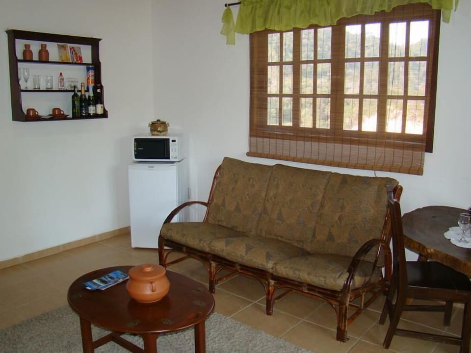 Honeymoon Triple Room, 1 King Bed with Sofa bed, Mountain View, Mountainside | Living room | 32-inch LCD TV with satellite channels, TV, DVD player