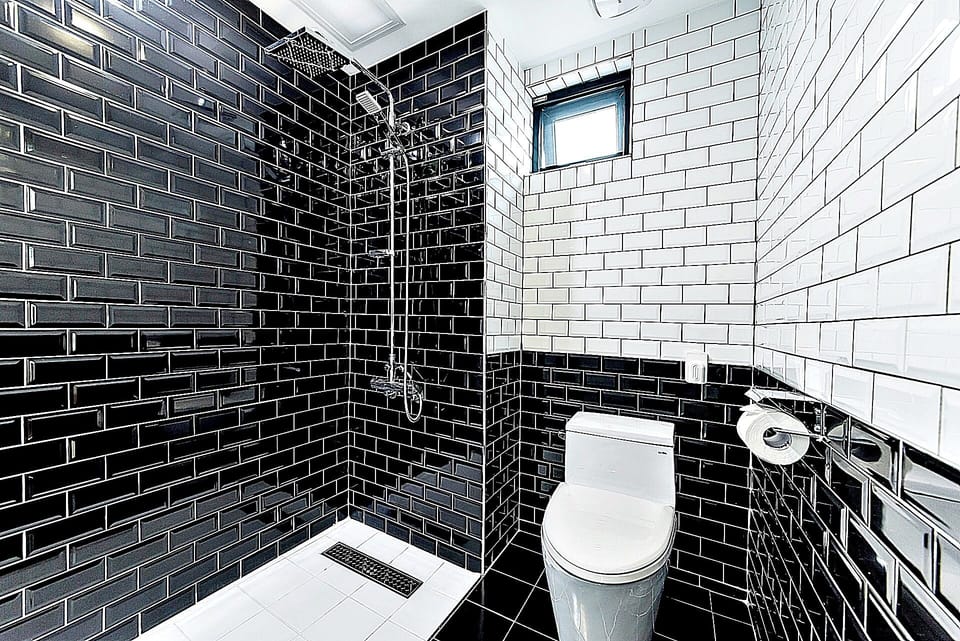 Shower, free toiletries, hair dryer, slippers