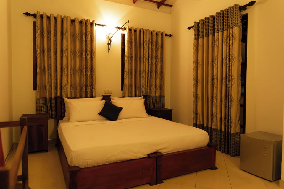 Premium bedding, pillowtop beds, laptop workspace, blackout drapes