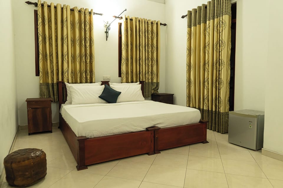 Premium bedding, pillowtop beds, laptop workspace, blackout drapes