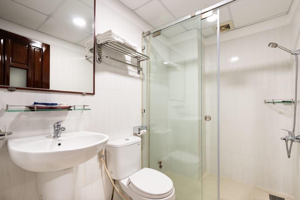 Shower, hydromassage showerhead, designer toiletries, hair dryer