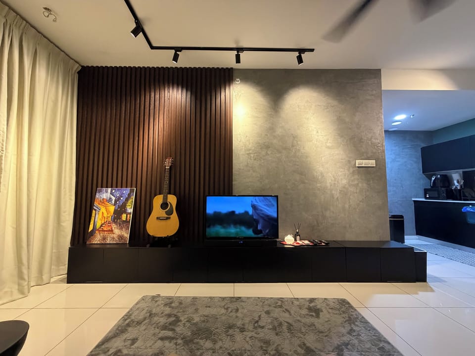 Deluxe Apartment | Living area | Smart TV