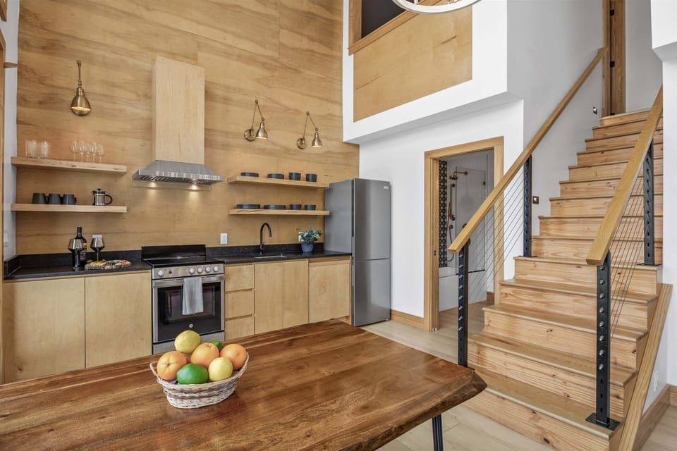 Functional kitchen with storage, appliances, and prep space.
