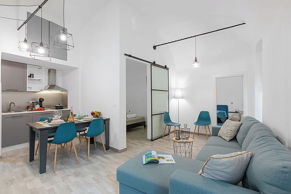 Standard Apartment, Multiple Bedrooms, 2 Bathrooms (Saro House) | Living area | 21-inch TV with cable channels