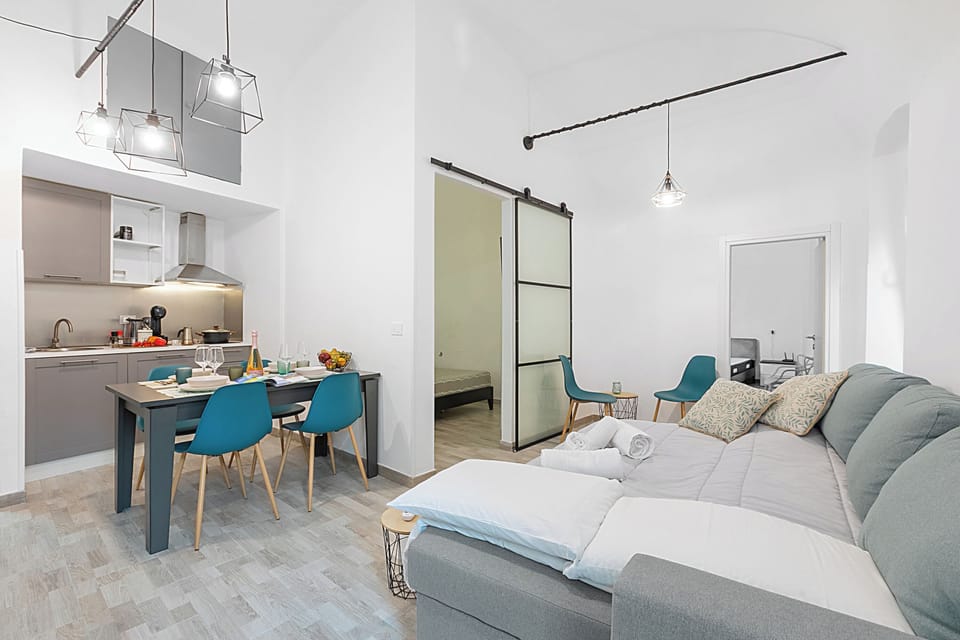 Standard Apartment, Multiple Bedrooms, 2 Bathrooms (Saro House) | Living area | 21-inch TV with cable channels