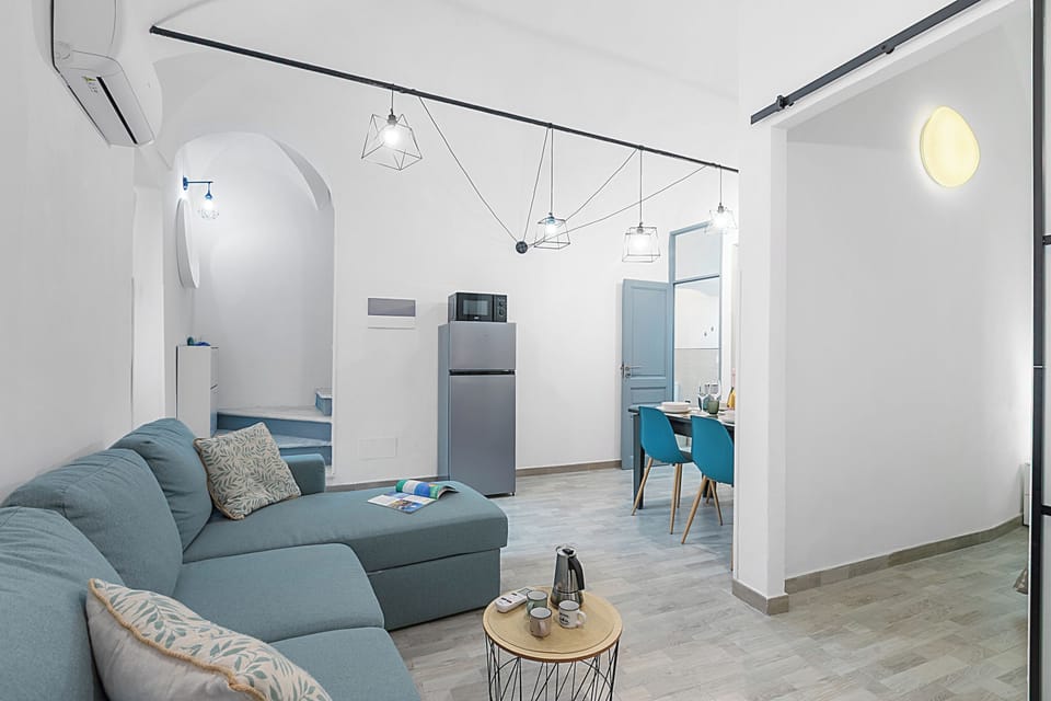 Standard Apartment, Multiple Bedrooms, 2 Bathrooms (Saro House) | Living area | 21-inch TV with cable channels